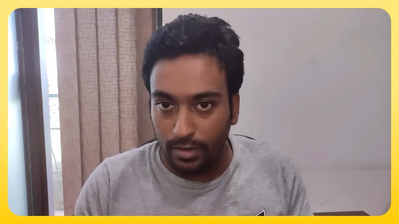 Presenter facing camera explaining resource management for small business digital marketing.